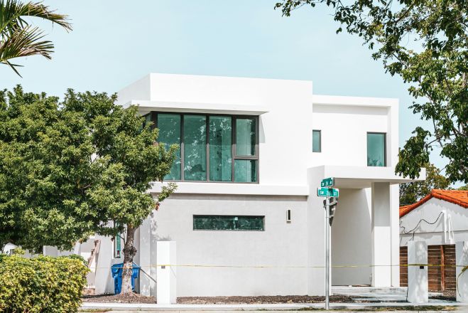 Explore this modern Miami residence with sleek lines and large glass windows.